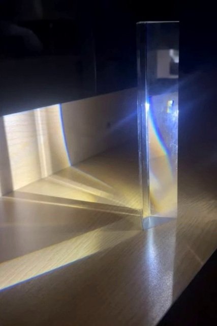Real prism experiment showing white light separated into visible colors